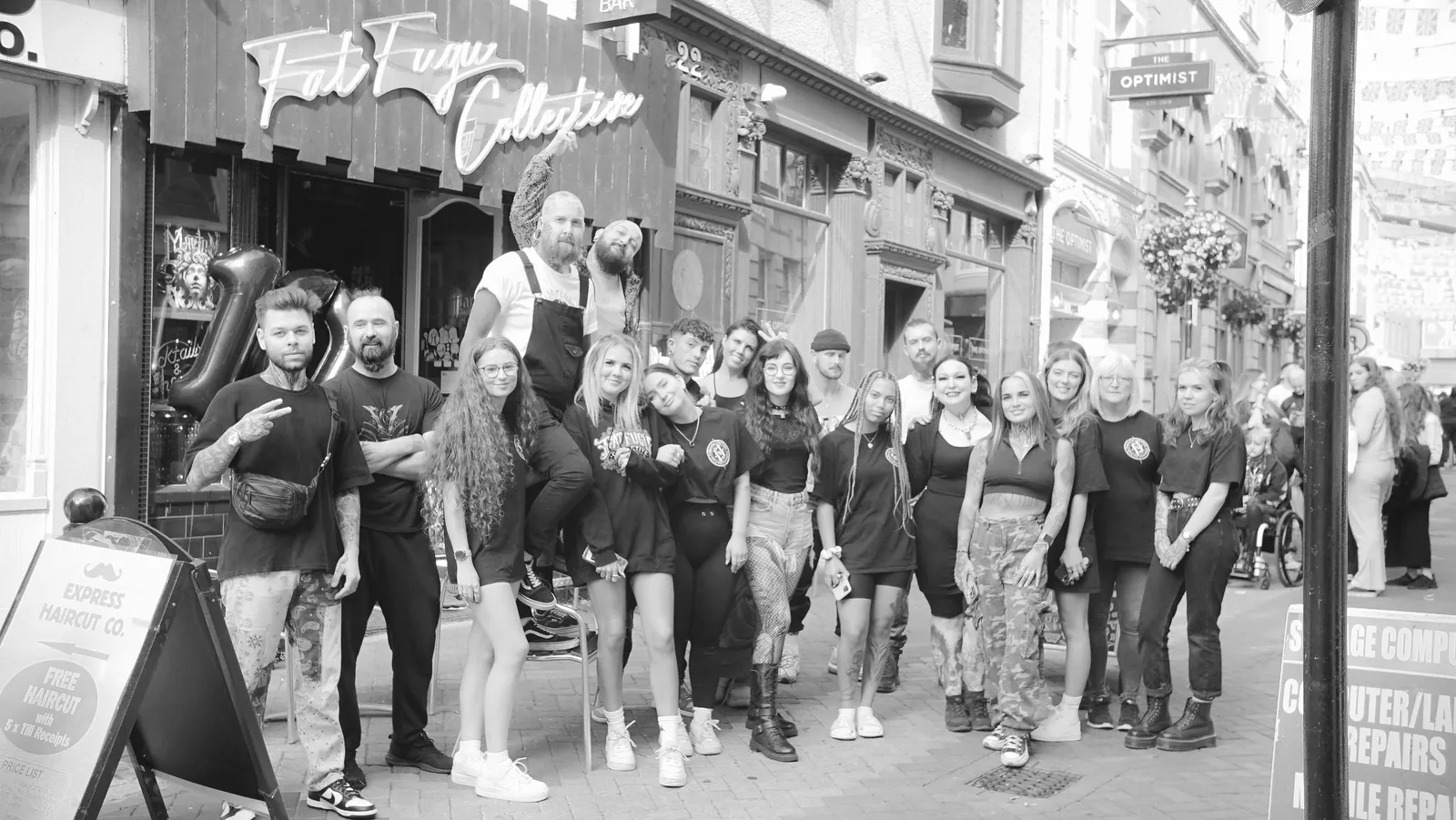 The Fat Fugu team outside the Fish Street shopfront, the full roster of artists, piercers and front of house lined up across the pavement.